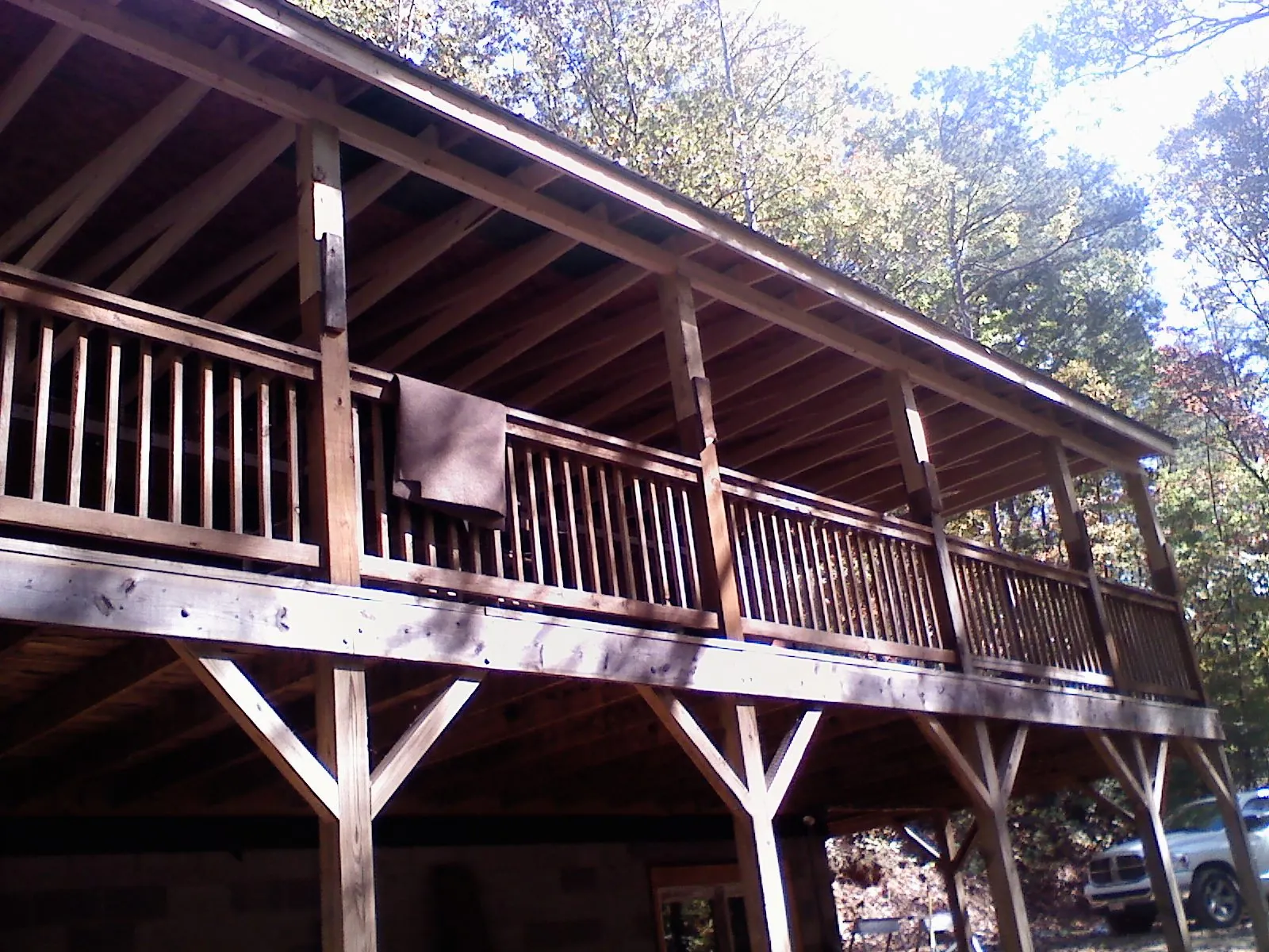 Timber framing under a new elevated porch and deck — Roof Leak Repair in Lowry by Roofing Brothers